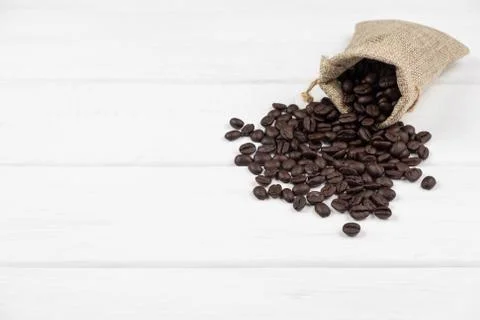 Selective focus on coffee beans in a brown bag Stock Photos