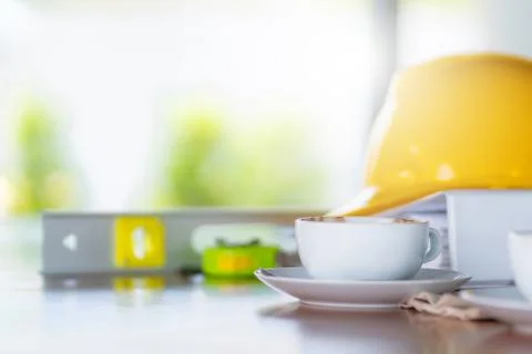 Selective focus of Coffee in white cup on wooden table with blurred background 写真素材
