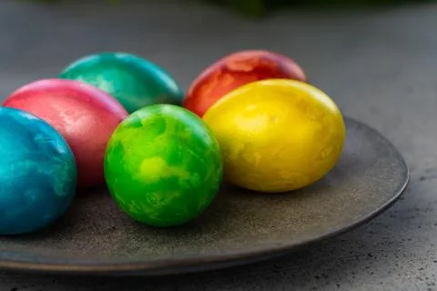 Selective focus, colored chicken eggs with food dye Stock Photos
