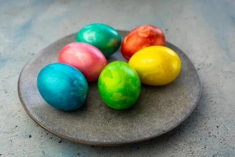 Selective focus, colored chicken eggs with food dye Stock Photos