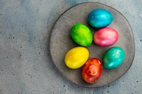 Selective focus, colored chicken eggs with food dye Stock Photos
