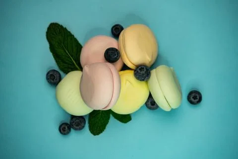 Selective focus, colored fruit marshmallow with blueberry berries Stock Photos