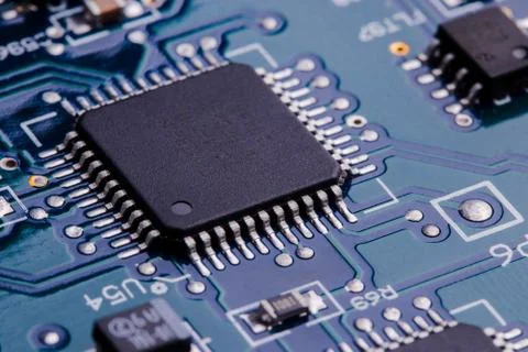 Selective focus of computer motherboard chip and other details. Stock Photos