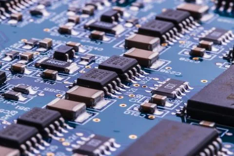 Selective focus of computer motherboard chip and other details. Stock Photos