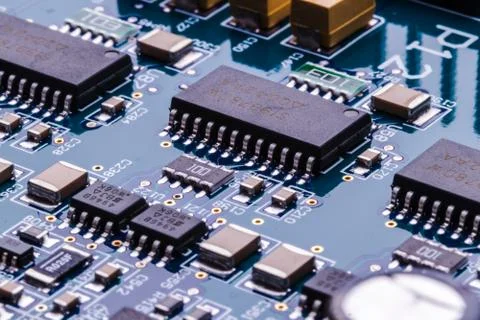 Selective focus of computer motherboard chip and other details. Stock Photos