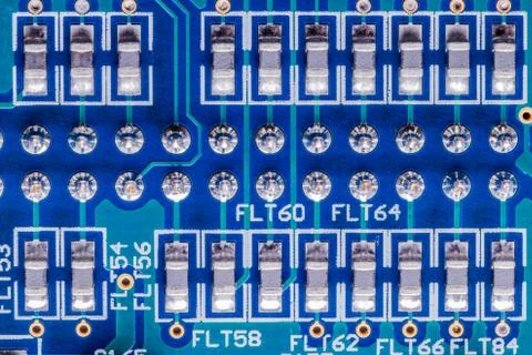Selective focus of computer motherboard chip and other details. Stock Photos