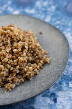 Selective focus, cooked buckwheat on a plate Stock Photos