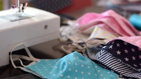 Selective focus on cotton fabric cotton face mask made at home. Video stock 128207963
