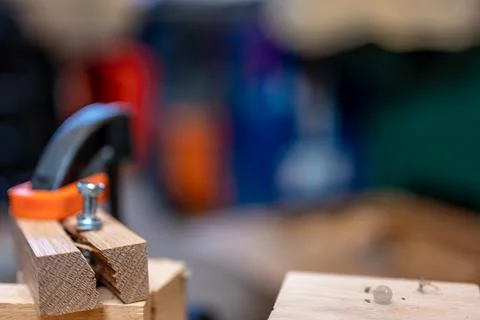 Selective focus on cracked and split wood from not drilling a pilot hole before Stock Photos