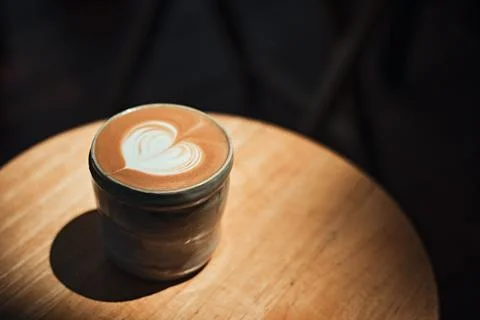 Selective focus cup of hot latte art coffee Stock Photos