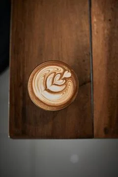 Selective focus cup of hot latte art coffee Stock Photos