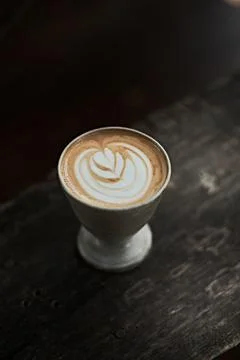 Selective focus cup of hot latte art coffee Stock Photos