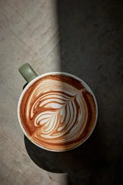 Selective focus cup of hot latte art coffee Stock Photos