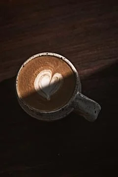 Selective focus cup of hot latte art coffee Stock Photos