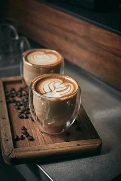 Selective focus cup of hot latte art coffee Stock Photos
