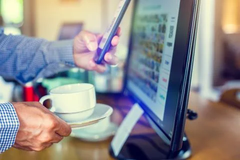 Selective focus to customer scan QR code to payment and printing receipt at c Stock Photos