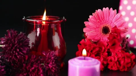 Selective Focus On Decorative Red Or Maroon Pillar Wax Candle Glowing Stock Footage 165417204