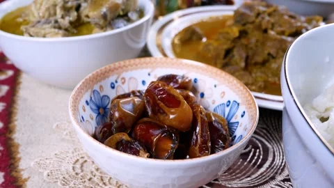 Selective focus of delicious dried dates (Kurma) in the bowl. Stock Footage 281220532