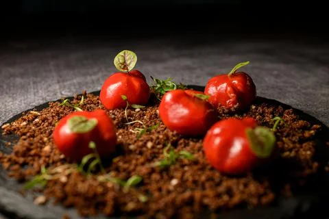 Selective focus on delicious snack covered with red glaze on ground meat Stock Photos