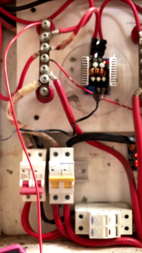 Selective focus of a digital multimeter testing electrical wiring. 스톡 동영상 345864949