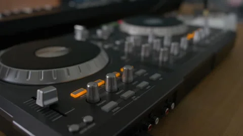 Selective Focus of DJ Mixer with Knobs, Sliders and Buttons on Wooden Table 스톡 동영상 314658490