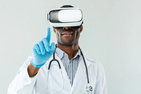 Selective focus of doctors hand making a touch Stock Photos