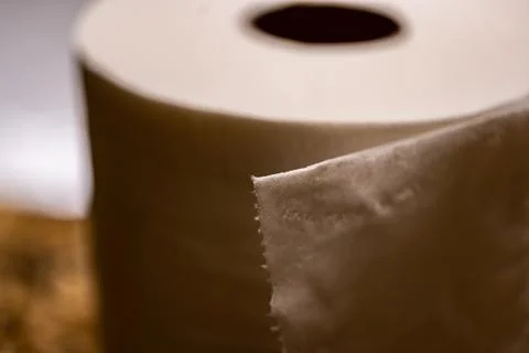 Selective focus on the edge sheet of a roll of toilet paper where individual Stock Photos