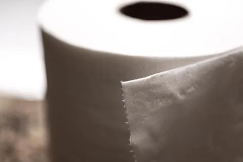 Selective focus on the edge sheet of a roll of toilet paper where individual Stock Photos