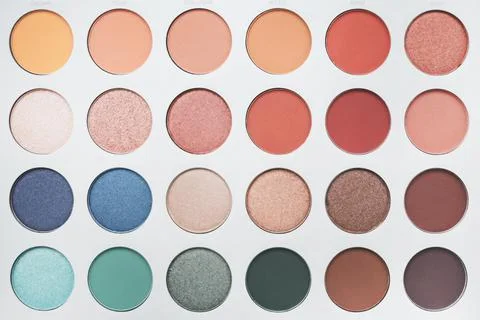 Selective focus of eyeshadow palette with various colors in pearly and matte Stock Photos