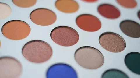 Selective focus of eyeshadow palette with various colors in pearly and matte Stock Photos