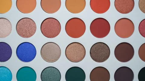 Selective focus of eyeshadow palette with various colors in pearly and matte Stock Photos