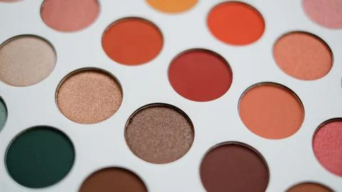 Selective focus of eyeshadow palette with various colors in pearly and matte Stock Photos