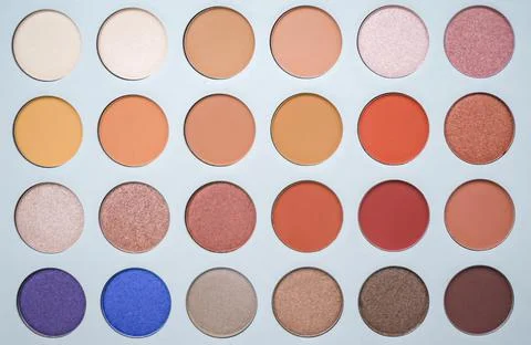 Selective focus of eyeshadow palette with various colors in pearly and matte Stock Photos