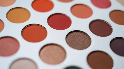 Selective focus of eyeshadow palette with various colors in pearly and matte Stock Photos