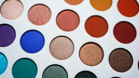 Selective focus of eyeshadow palette with various colors in pearly and matte Stock Photos