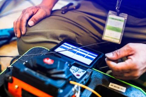Selective focus to fiber optic splicing cable tools. Fixing Internet Cable... Stock Photos