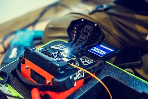 Selective focus to fiber optic splicing cable tools. Fixing Internet Cable... 写真素材