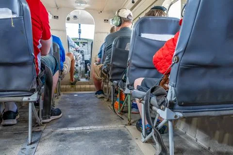 Selective focus floor level view inside a small private tour plane with Stock Photos