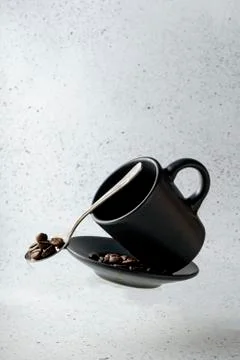 Selective focus, flying espresso mug Stock Photos
