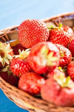 Selective focus on fresh red strawberry with blurred background. Stock Photos
