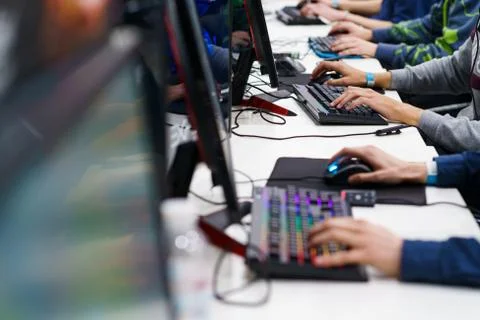 Selective focus on gamers' hands on mouse and keyboard Stock Photos