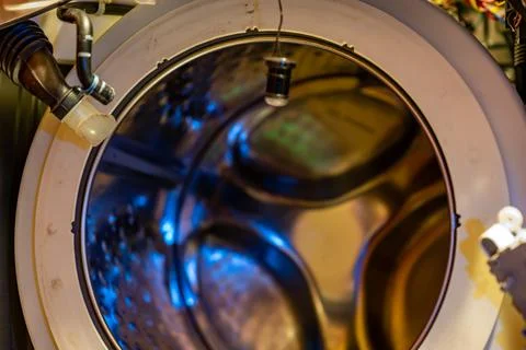 Selective Focus on the gasket mount of a front loading washing machine being Foto stock