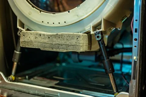 Selective Focus on the gasket mount of a front loading washing machine being Stock Photos