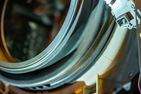 Selective Focus on the gasket mount of a front loading washing machine being Foto stock