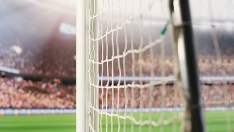 Selective focus of goal net rope and side post filling foreground Stock Footage 338000483