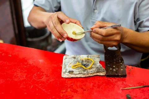 Selective focus to the goldsmith is preparing Stock-Fotos