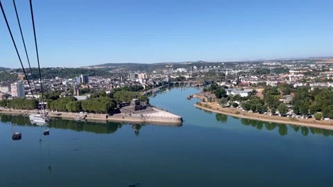Selective focus gondola cable car approaching Deutsches Eck above Koblenz r.. Stock-Footage 344931595