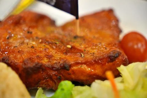 The selective focus grill chicken ready for eating Stock Photos