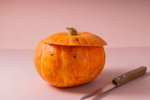 Selective focus. Halloween pumpkin. instructions for carving a pumpkin face Stock Photos