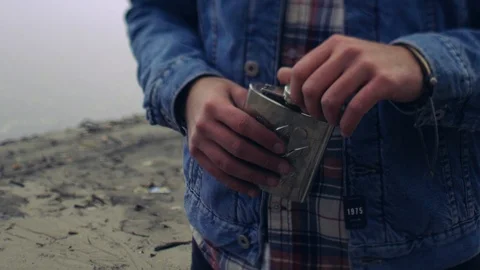 Selective focus on handsome young man in trendy outfit with backpack standing Video stock 108731424